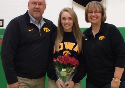 On college signing day, Iowa Hawkeyes basketball player Alyssa Wilson officially receives the opportunity to join the Iowa team.
